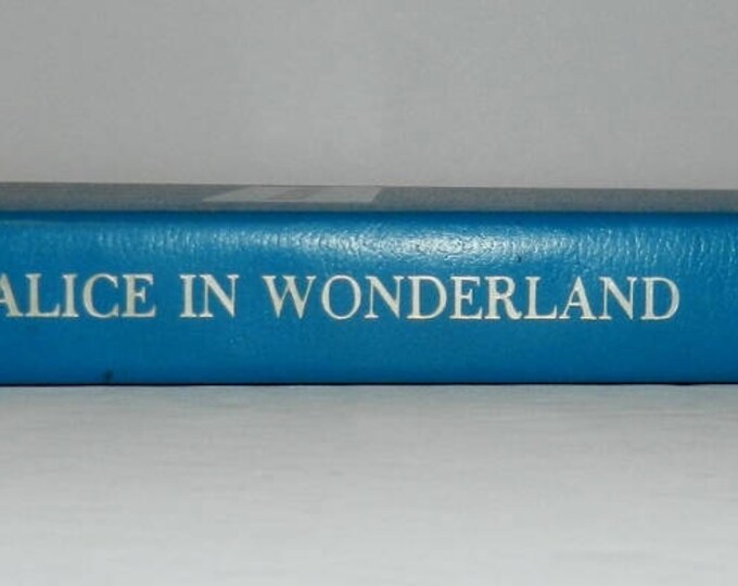 Best Loved Classics-Alice In Wonderland and Through The Looking Glass Author: Lewis Carroll