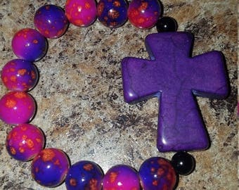 Pink and purple beaded purple cross bracelet