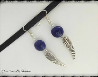 Dangle earrings with blue wings and night oval bead