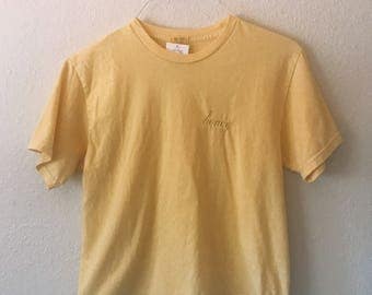 yellow brandy melville shirt