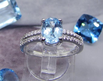 Zirconium ring with Blue Topaz on silver size 56