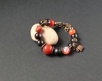Red black gemstone bracelet Red carnelian bracelet Orange stone jewelry Love protection bracelet Garnet bracelet Elephant charm bracelet