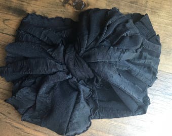 Black ruffle wrap