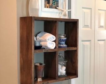 floating bathroom shelves over toilet