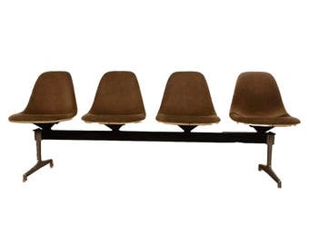 Tandem Bank, Bank of visitors by Charles & Ray Eames for Herman Miller 1964 fiberglass shells