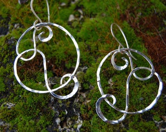 Earrings in sterling silver wire swirls and spirals