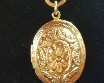 Gold Locket chain necklace beautiful design 24 inches long.