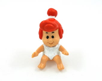 Vintage 1980s baby Wilma Flintstone, Hanna Barbera plastic cartoon figure, Flinstone, red top knot, modern stone age family, happy meal