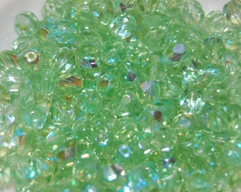 10 faceted 6mm Green freshwater pearls