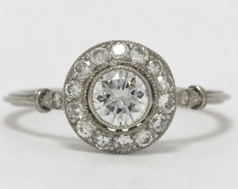 Classic Art Deco Engagement Ring Over Half Carat Round Diamond H VVS1 Platinum Halo Diamonds Milgrain Bezel Low Setting Crown Fleur de Lis