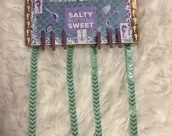 Salty but sweet bow holder