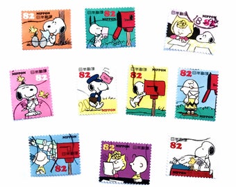 10 x Peanuts Snoopy Japanese used postage stamps - off paper all different - Japan - for crafts, stamp collecting, card making, scrapbooking