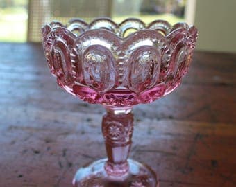 Pink glass pedestal dish