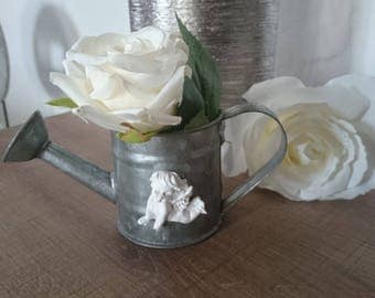 Small zinc watering can and her Cherub plaster