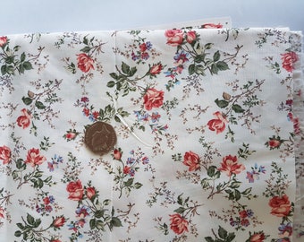 Cream poly-cotton fabric remnant with orange/red/green rose print