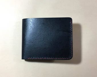 Veg tanned leather wallet with manual locking system