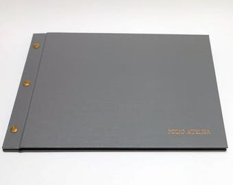 Bespoke screw post binding (presentation portfolio, menus)