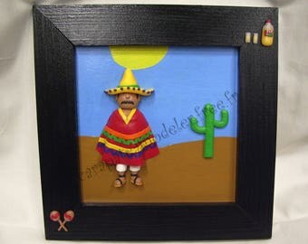 Mexican decorative painting and its multicolored poncho