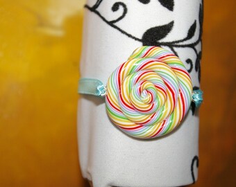 Bracelet made of polymer clay lollipop and Ribbon