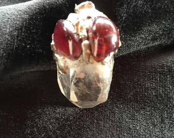 Quartz and garnet pendant