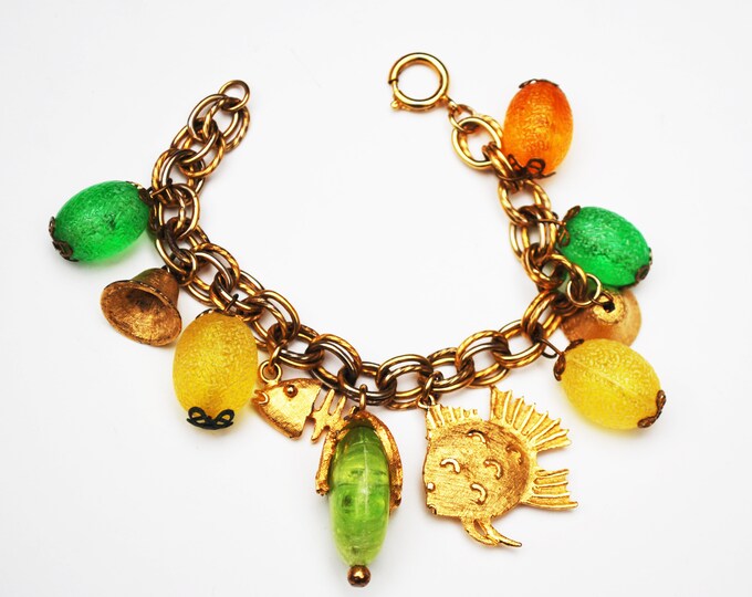 Cha cha Bracelet - colorful Tutti Frutti - gold fish -yellow orange green lucite - plastic - gold bell - dangle Bangle