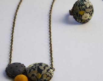 Necklace in brass and liberty English grey and mustard