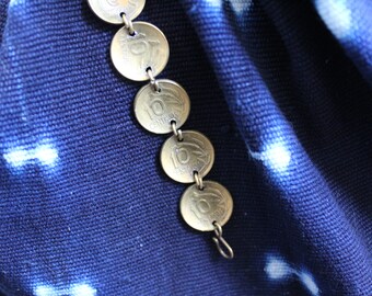 Coin bracelet dating from 1969 and 1970's. Beautifully made piece. Lovely patina.