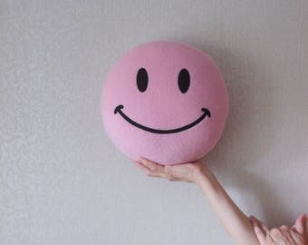 pink smiley pillow