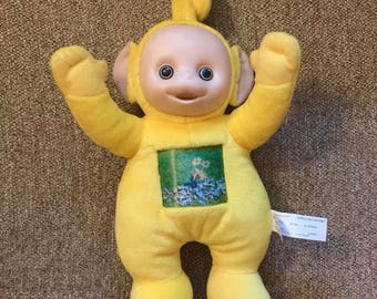 yellow teletubby doll