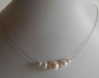 Bridal white and pale pink pearls and rhinestones