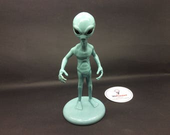 grey alien figurine