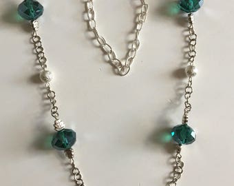 Silver necklace with green glass beads