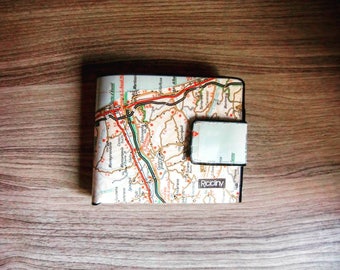 Wallet with geographical Atlas
