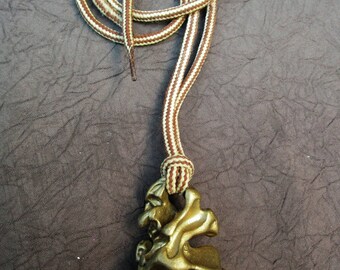 a sculpture Medallion Choker