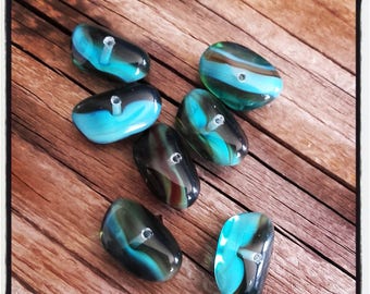 set of 7 blue/green marbled glass beads