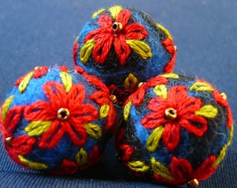 wool felted and embroidered red and green beads