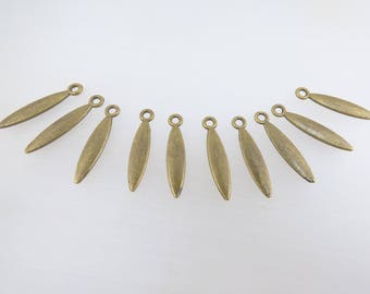 25 charms elongated metal bronze