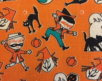 Trick or Treat Toss Halloween fabric in Orange by Penny Rose Fabrics