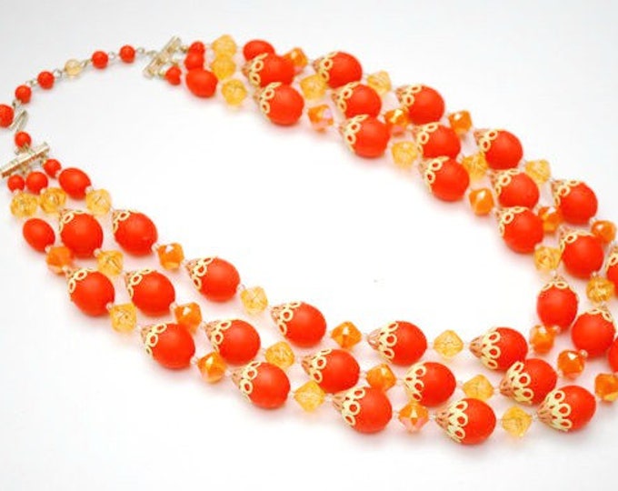 Orange Triple Strand Bead Necklace and earrings - Signed Hong Kong - Lucite plastic - yellow - clip on earring