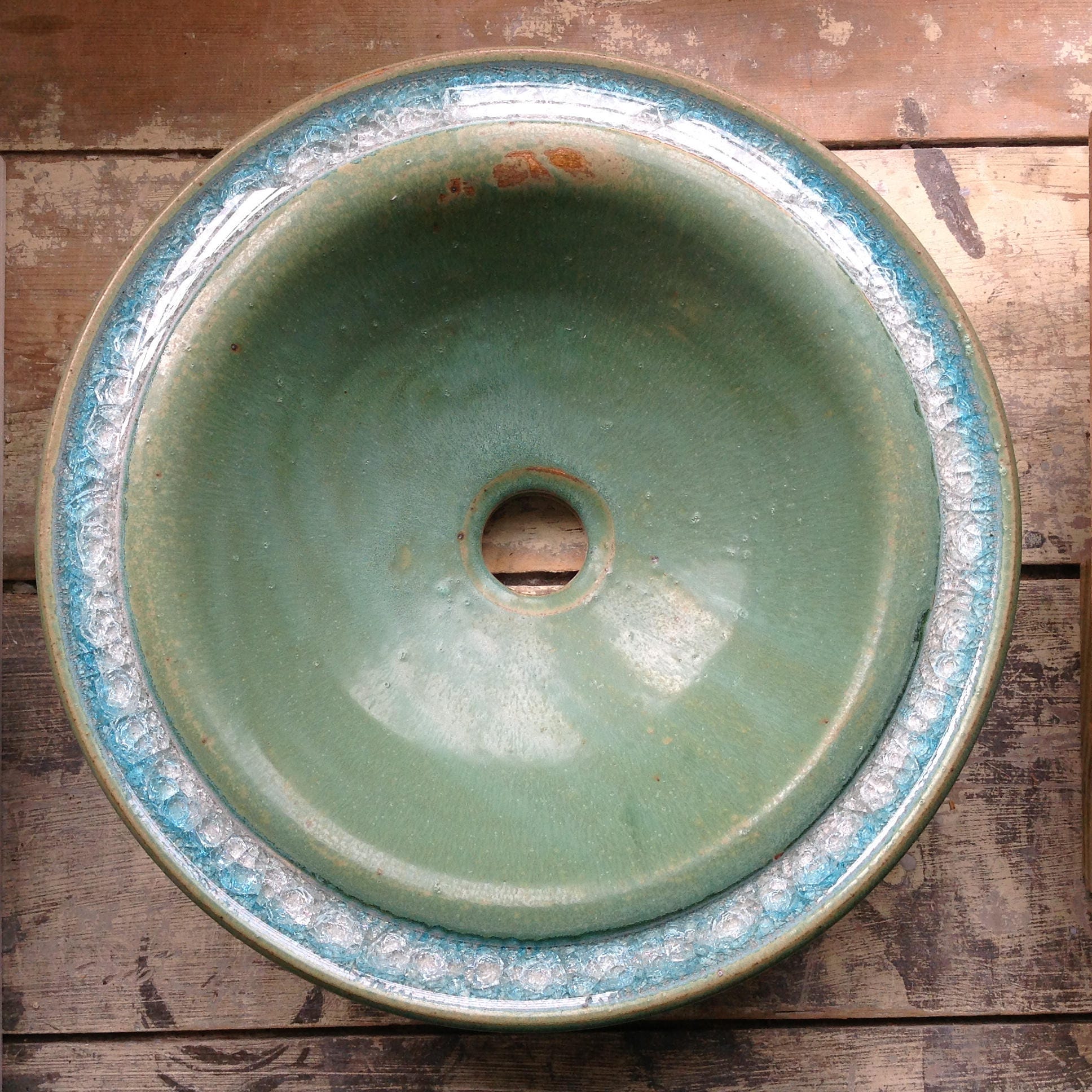 Handmade ceramic vessel sink with fused glass rim in sea green
