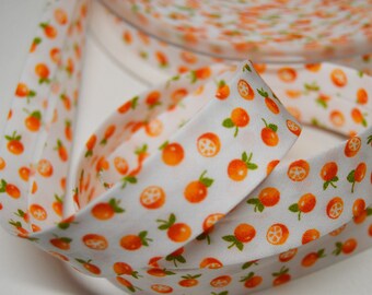 Sewing bias folded 2cm orange background pattern, cotton white (m) ref: BIAI05