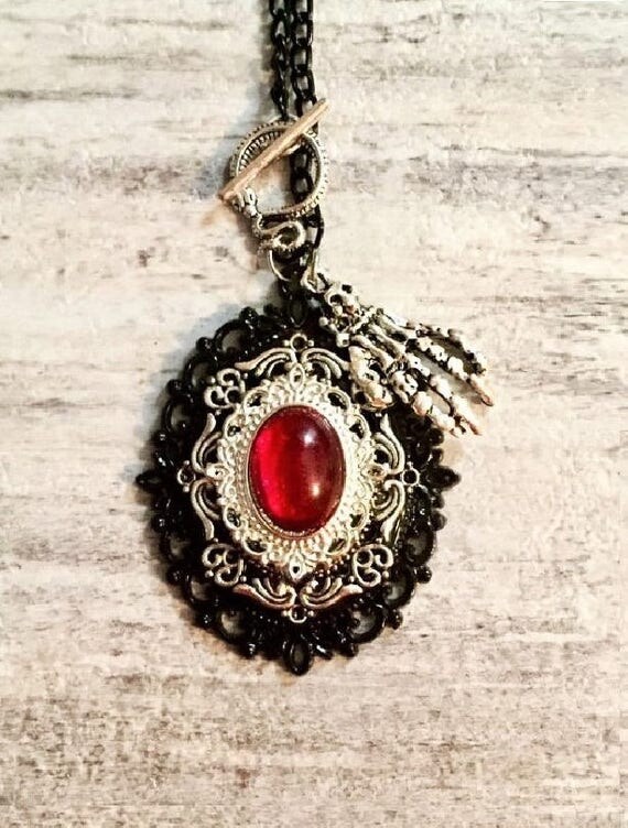 Victorian Gothic Steampunk Pendant, Black Silver and Red Necklace, Skeleton Hand, Ruby Red Cabochon, Layered Metal Pendant, Toggle Clasp by OneStopSteamShoppe steampunk buy now online