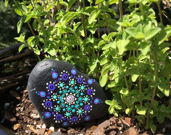 Mandala stone in blues and purples