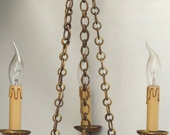 French tole chandelier. French style Empire tole and bronze chandelier.