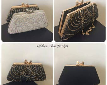 Women shimmering clutch with crystals and removable chain shoulder strap.