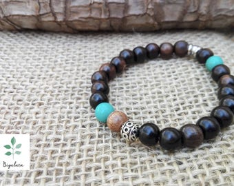 Unisex bracelet made of ebony wood and turquoise.