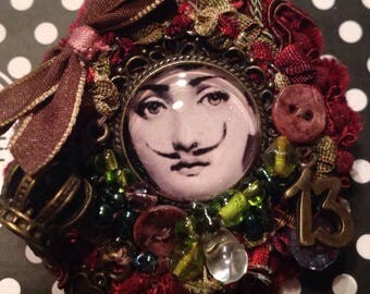 Fornasetti a mustache women brooch