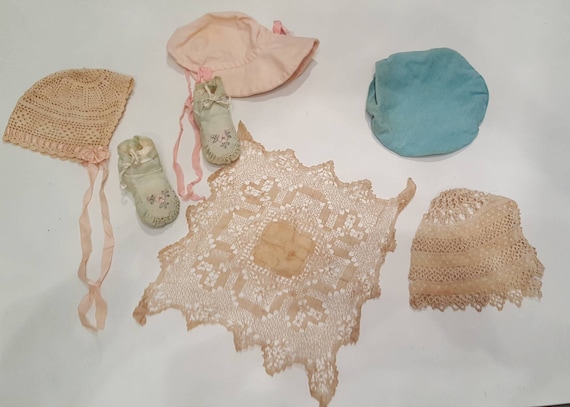 Lot of vintage baby hats, shoes, doily