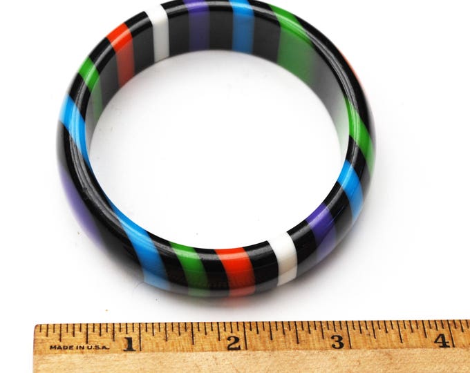 stripped Lucite bangle - Purple Black orange green blue stripes - vintage plastic bracelet