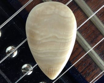 SEASHELL GUITAR PICK- teardrop shape, 2.9mm thick, dome grip. Made from actual sea shell.